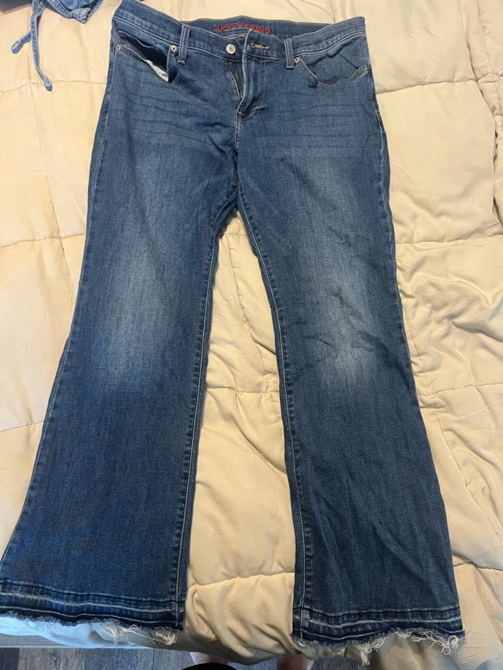 Lucky Brand Medium Blue Flare Jeans with Frayed Hem